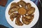 Plate of fried Nepalese momos and its achar (sauce)