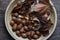 Plate full of Autumn leaves, acorns and seed pods