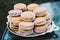 Plate full of cornstarch alfajores filled with dulce de leche. Typical South American dessert.