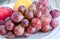 Plate full of fruits on table