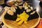 Plate full of Onigiri or rice ball and beer at Kaniya Honten restaurant in Nagasaki