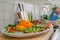 A Plate Full Of Sliced Watermelons, Oranges, and Grapes Waiting to Be Served in a Birthday Party