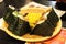 Plate full of various Onigiri or rice bowl and beer at Kaniya Honten restaurant in Nagasaki