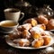 A Plate Of Golden Brown Beignets Piled High Dusted