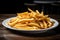 a plate of golden french fries, perfectly seasoned and ready to be devoured