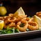 A plate of golden fried calamari rings