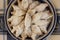 A plate of Greek cookies on blue and white