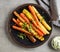 Plate of grilled colorful carrots