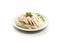 Plate with hainanese popular asian food with chicken and rice on white background.Macro.AI Generative