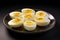 a plate of hard boiled eggs