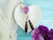 plate heart, fork, knife flower chrysanthemum, beautiful elegant party bell, on a wooden background