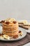 Plate of maple pecan pancakes with fresh bananas