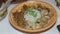 Plate of marinated mushrooms on the table