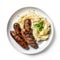 A plate of mashed potatoes and sausages