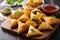 plate of mouth-watering samosas with a spicy and flavorful ground lamb filling, garnished with chopped onion