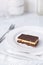 A plate with a Nanaimo bar - a traditional Canadian dessert