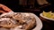 Plate of oysters on ice is placed on the table