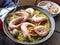 A plate of paella for two people