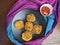 A plate with Paneer Cutlet, a breaded crispy patty