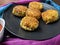 A plate with Paneer Cutlet, a breaded crispy patty