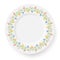 Plate with a pattern of lilies on a white background. A wreath of flowers is suitable for registration of bright spring