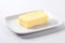 Plate piece butter food. Generate AI