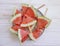 Plate of a piece of watermelon tasty snack refreshment on a wooden background