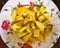 Plate with pieces of mango. Delicious tropical juicy fruit. Healthy nutrition