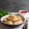 A plate of Polish pierogi dumplings on a rustic table.