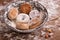 Plate with powders and shortbreads on wooden table