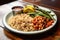 a plate of rice, beans, and grilled veggies