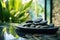 Plate of Rocks on Table - Natural and Rustic Decoration for Homes or Gardens, Hot stone massage at spa salon in luxury resort with