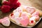 Plate of rose and red valentines cookies