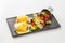 Plate with sandwiches with salmon and eggs with salad isolated o