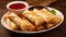 A plate of savory and crispy spring rolls with dipping sauce