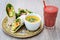 Plate of soup sandwich wrap lunch juice smoothie