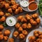 A plate of spicy buffalo cauliflower bites with a side of ranch dressing1