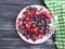 Plate of strawberries, blueberries, vitamin delicious organic antioxidant gooseberries product summer on a wooden background