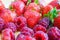 Plate with summer ripe berries - strawberries, strawberries, raspberries. Vitamin delicious simple natural vegan juicy dessert