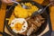 Plate of tasty sizzling stir-fried meal on iron platter