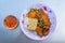 Plate of tasty Vietnamese pork chop rice on table