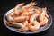 plate of tiger shrimp prawns in variety of sizes and shapes