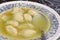 Plate of traditional chicken matzo ball soup