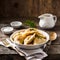 A plate of traditional Polish pierogi dumplings.