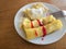 Plate with traditional Ukrainian deserts  - flapjacks and vareniky