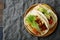 Plate with two Mexican Taco and ground beef, vegetables