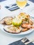 Plate of typical seafood served in Valencia, Spain