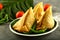 Plate  of vegan snack samosa