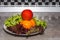 Plate with washed vegetables. Wet lettuce leaf and tomatoes