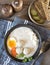 A plate with white Polish soup. White borsch with egg, meatballs, cottage cheese and carrots